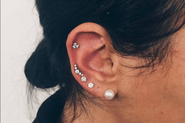 two ear piercings lobe