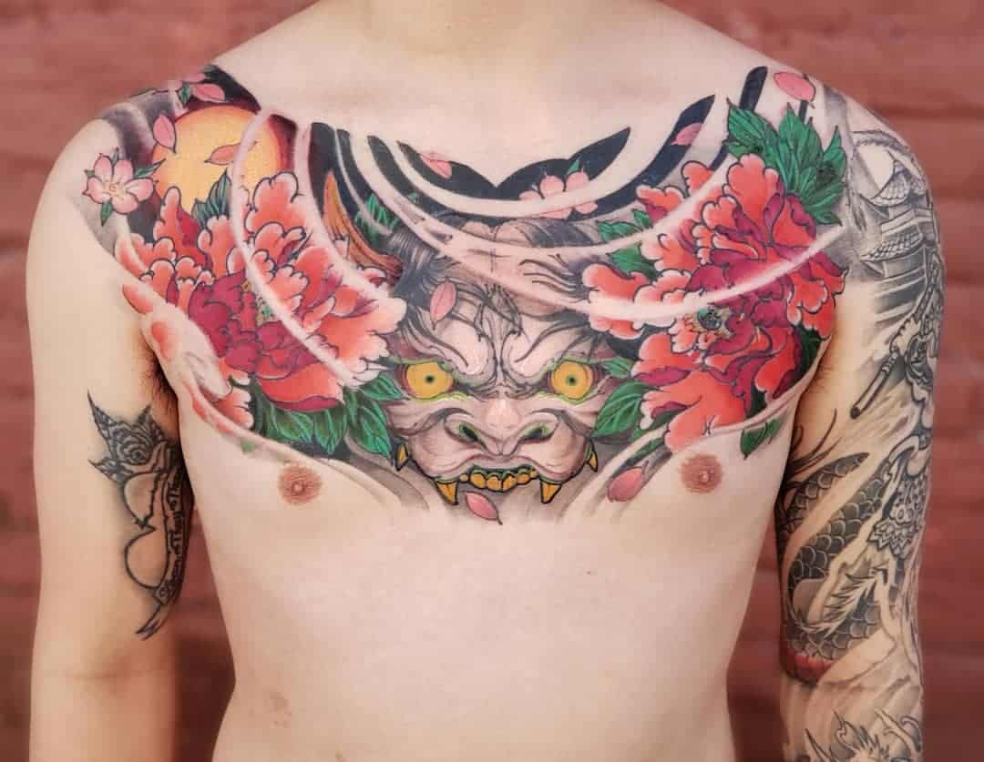 japanese mask tattoos chest