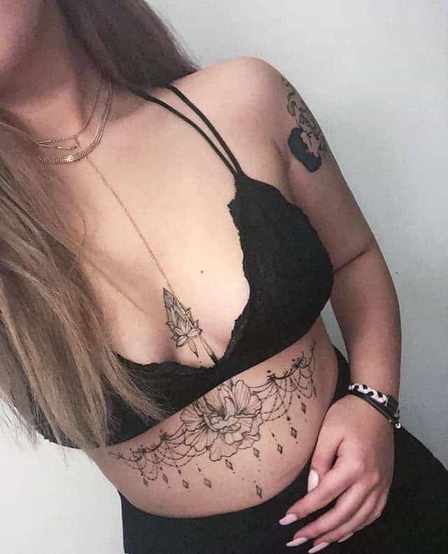 Sternum and under Breast tattoo, plus a very nice hand bra.