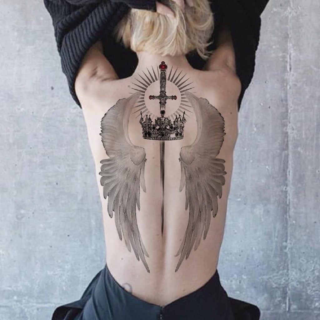 sword and wings tattoo