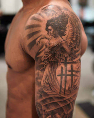 praying angel arm tattoos