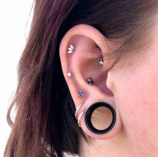 The Ultimate Guide to Ear Cartilage Piercings: Types, Aftercare, and Expert Tips | Chronic Ink Tattoo