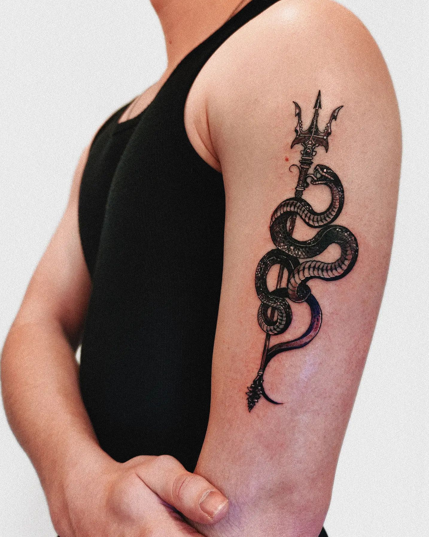 Atlantis king with trident tattoo idea | TattoosAI